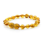 BALTIC AMBER TEETHING BRACELET. SIDE DRILL LIGHT COGNAC 6X4 MM