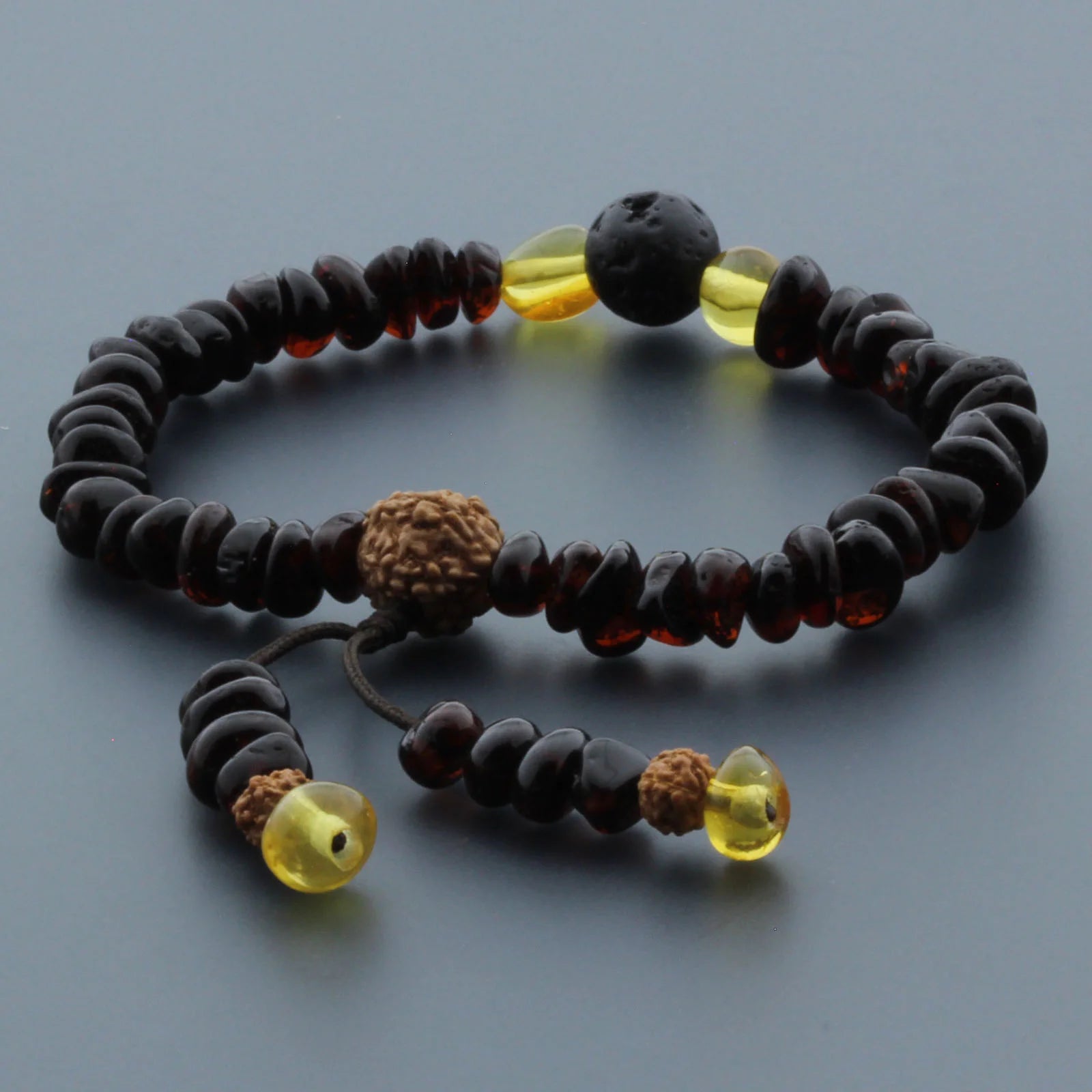 Adult Baltic Amber Bracelet with Lava Stone Mala Tassel. MS03