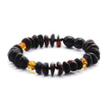 Yellow and black Baltic amber roundel baby bracelet, 15cm