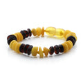Yellow and black Baltic amber roundel baby bracelet, 15cm