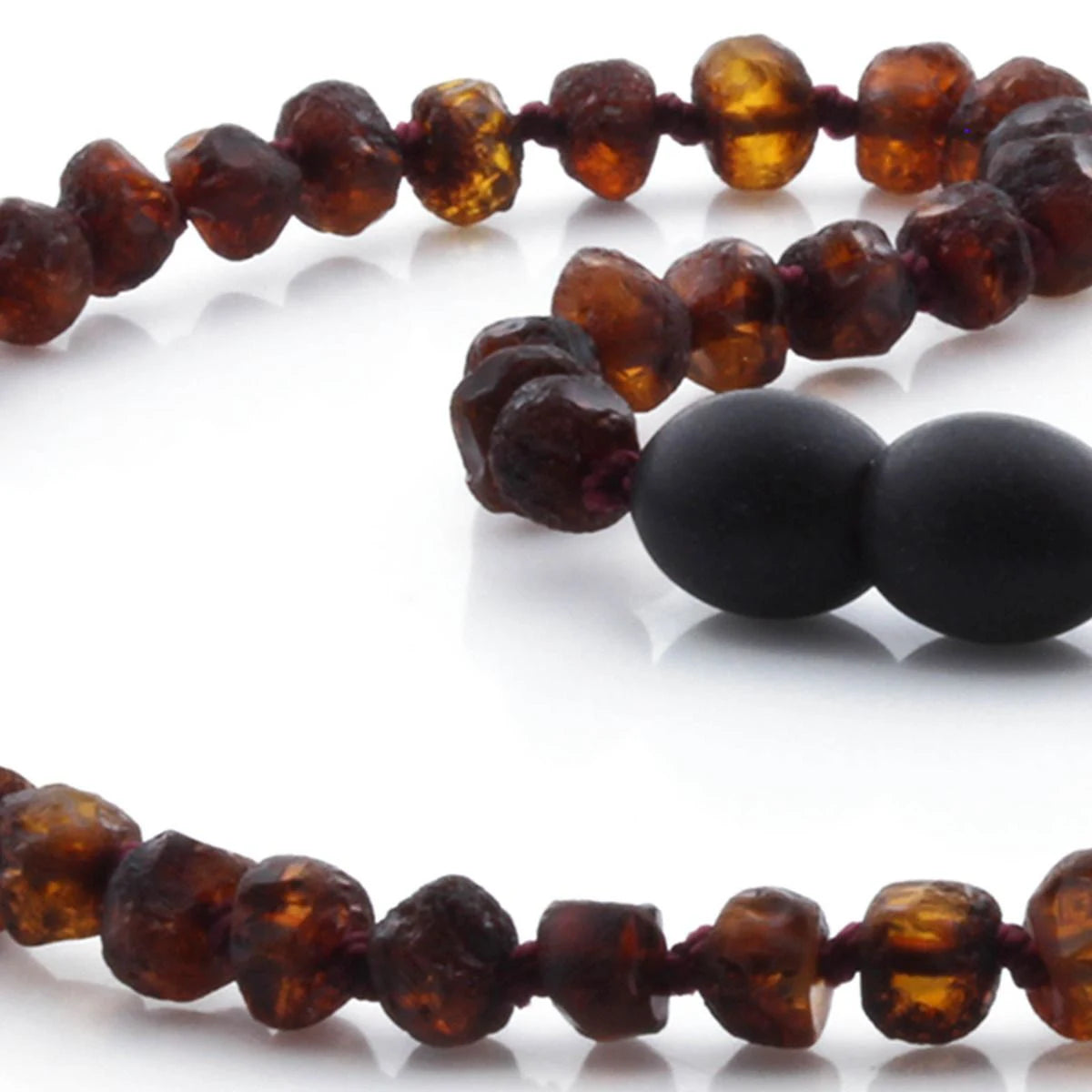 Baltic Amber Teething Necklace. Roundel Cognac 5mm - RO24