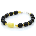 Yellow and black Baltic amber adult bracelet with lava stone and sterling silver