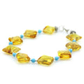 Yellow Baltic amber round adult bracelet with turquoise and sterling silver
