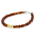 Cognac Baltic amber round flat adult bracelet with sterling silver