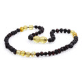 Yellow and black Baltic amber baroque baby necklace, 32cm